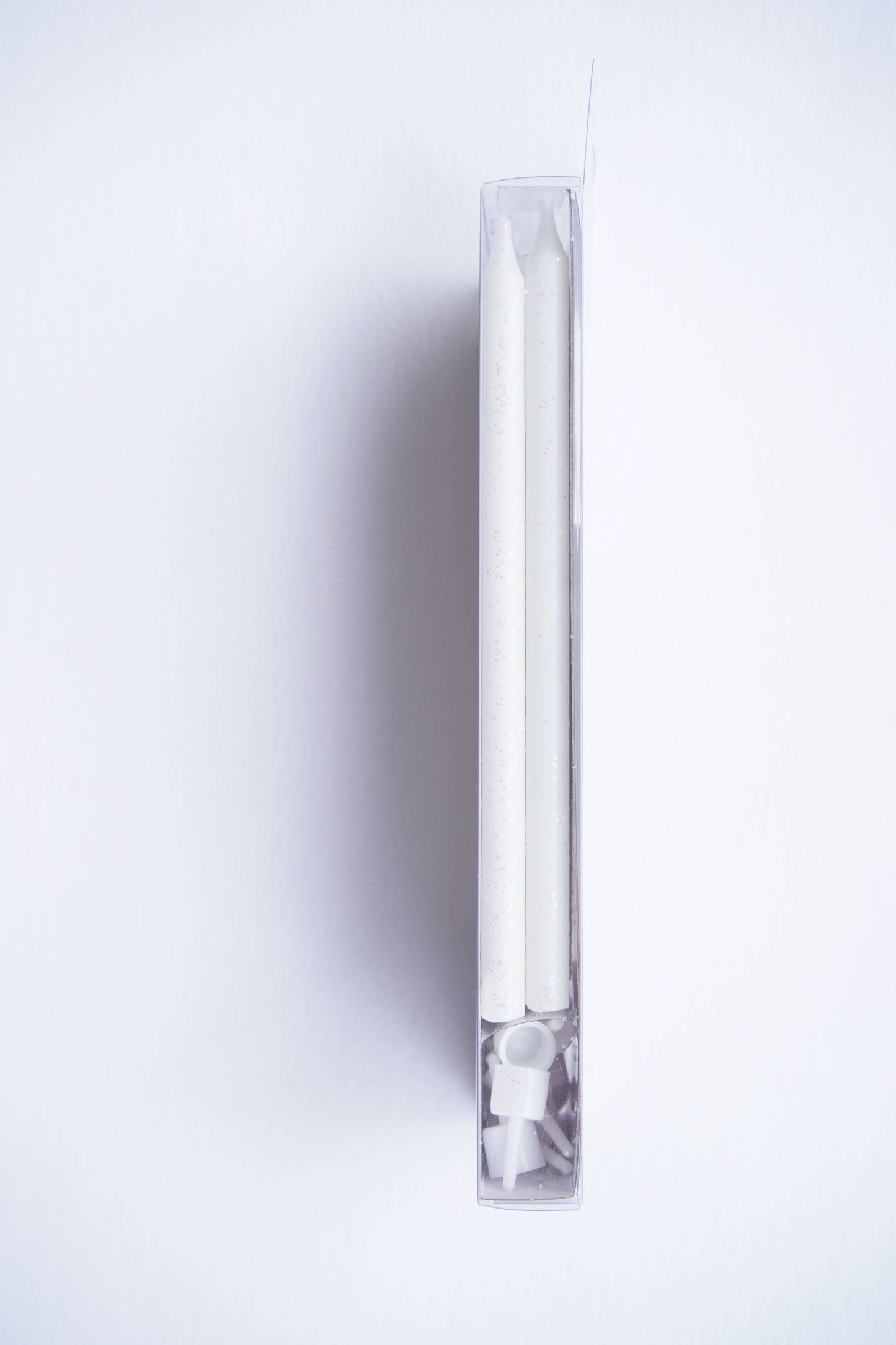 Tall White Glitter 16 Candle Set